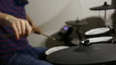 Drummer playing at the electronic drums kit Stock Footage 72192940