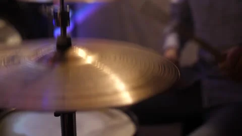 Drummer playing hi-hat cymbals in nightclub performing with live band. Stock Footage 313815340
