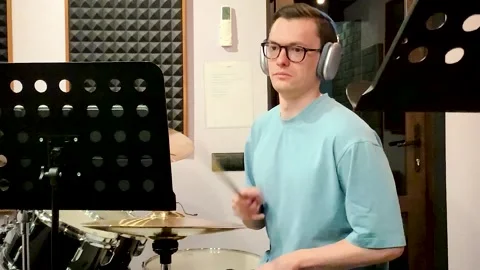 Drummer playing in a recording studio Stock-Footage 313994190