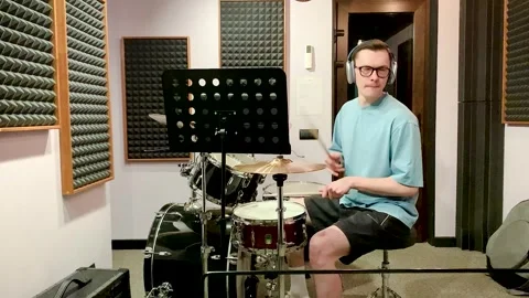 Drummer playing in a recording studio Stock-Footage 313994224