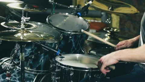 Drummer playing snare drum and hi-hat cymbal Stock Footage 247370443