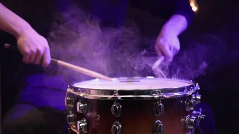 Drummer playing snare drum with smoke and beautiful lighting close up. Stock Footage 146942980