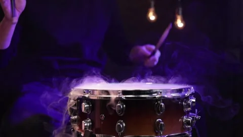 Drummer playing snare drum with smoke and beautiful lighting slow-motion. Stock Footage 149194382