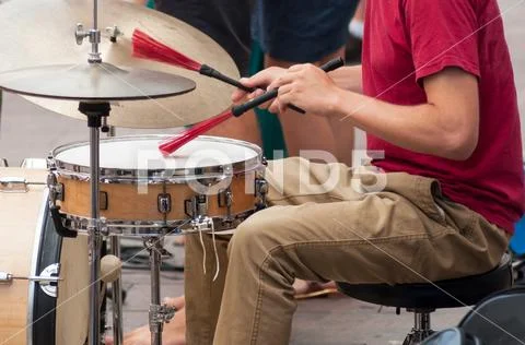 Drummer playing in the street Stock Photos