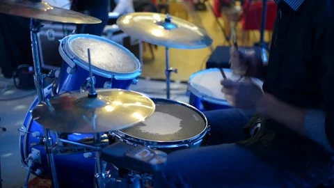 The drummer plays at a concert Stock Footage 70734086