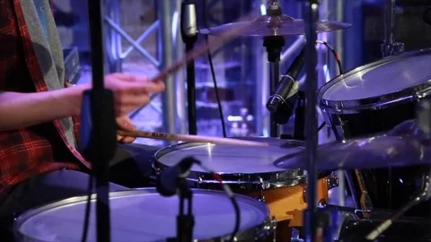 The drummer plays the drum a sticks. Stock Footage 127713113