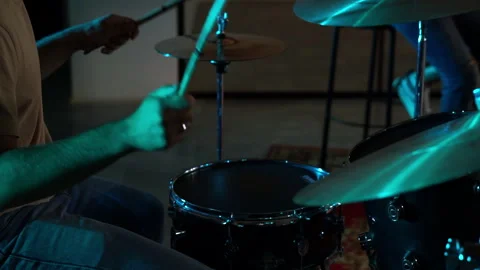 The drummer plays the drums. Also plays with the group. Stock Footage 257920462