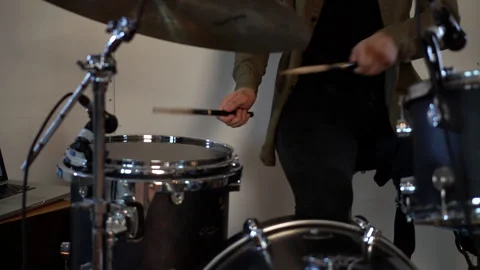 The drummer plays the drums. Learns to play the drums. Stock Footage 257546285