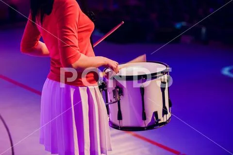 Drummer plays with drumsticks on rock drum set Stock Photos