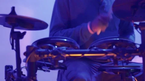 Drummer Plays his Electronic Drums to the Beat Stock Footage 203186072