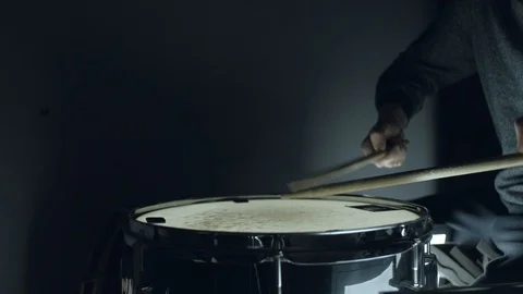 Drummer plays with sticks on a snare drum Stock Footage 101719954