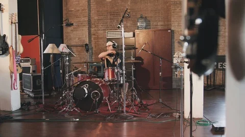 Drummer Resting in Recording Studio Move Left Stock Footage 89511625