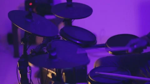 Drummer Rocks his Kit Hard in Changing Lights Stock Footage 203185973