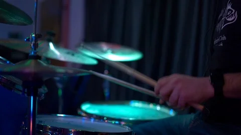 Drummer sits behind a drum kit Stock Footage 126393107
