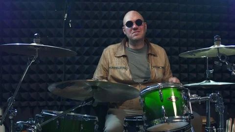 Drummer in sunglasses playing drums at performance Stock Footage 98010629