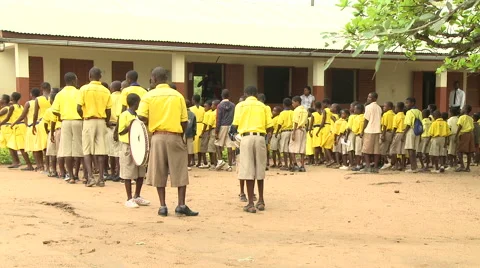 DRUMMERS AND STUDENTS MARCH AT SCHOOL ASSEMBLY Stock Footage 60115287