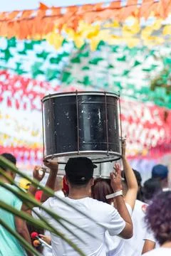Drummers carrying drums Stock Photos