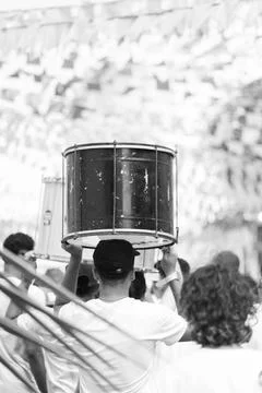 Drummers carrying drums Stock Photos