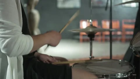 Drummer's hands close-up, the guy is holding drumsticks. Stock Footage 201339349