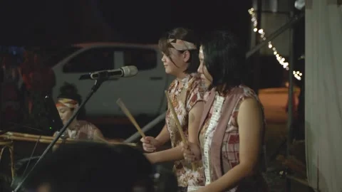 Drummers Perform with the Indigenous People at an Open Air Concert with Audio Video stock 157634413