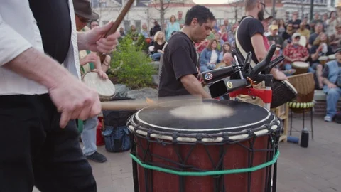 Drummers playing drums during Drum circle in Asheville, NC Stock Footage 103434721