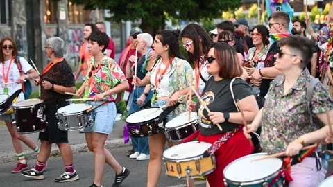 Drummers on Pride parade. LGBT flags. LGBTIQ March Pride Stock Footage 311284447
