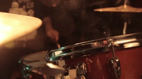 Drumming in slow motion Stock Footage