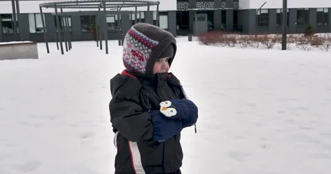 Drumming in the Snow: A Winter Adventure with a Little Boy Stock Footage 238802489