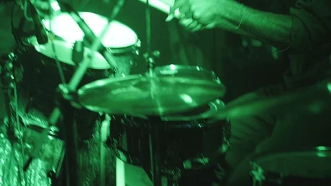 Drumming Under Green Lights 4K Stock Footage 87615224