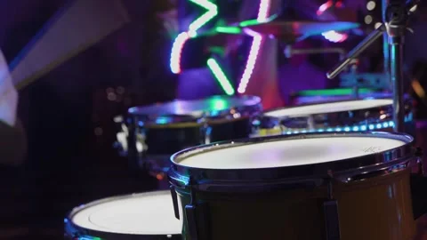 Drums with colored lighting at a performance Stock-Footage 306173935