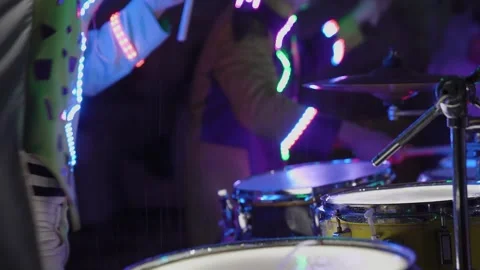 Drums with colored lighting at a performance Stock Footage 306173951