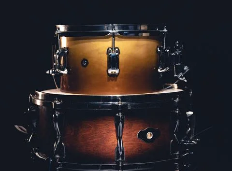 Drums on a dark background isolated, percussion instruments. Stock Photos