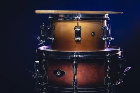 Drums on a dark background isolated, percussion instruments. Stock Photos