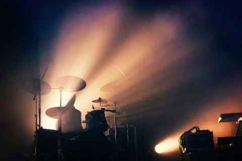 Drums on the stage, illuminated. Stock Photos