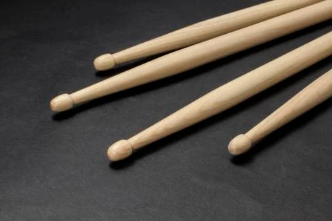 Drumsticks on a black background. Stock-Fotos