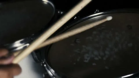 Drumsticks Drumming On A Drum Set in Dark Studio. Stock Footage 172342688