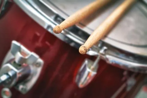 Drumsticks on drums Stock Photos