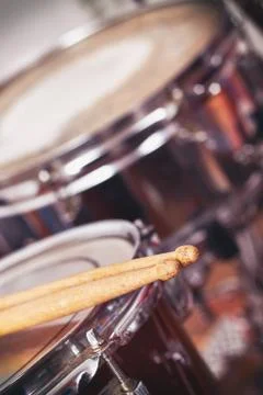 Drumsticks on drums Stock Photos