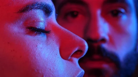 Drunk Attractive young couple the dark of night club.Flirt,gaze,drunkness Stock Footage 103519261