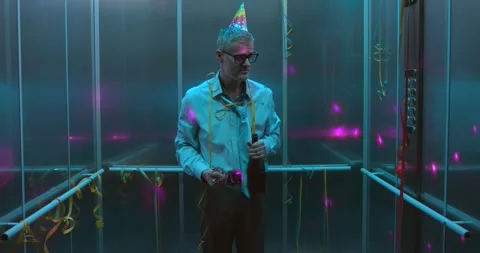 Drunk confused employee getting in the elevator 動画素材 302976877