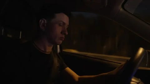 Drunk driver drives through the city at night Stock Footage 263050987