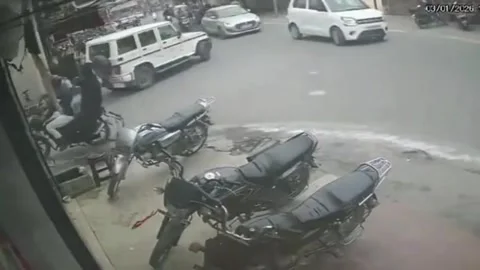 Drunk driver goes on rampage, car ploughs into shop, man thrown several f... Stock Footage 325765661
