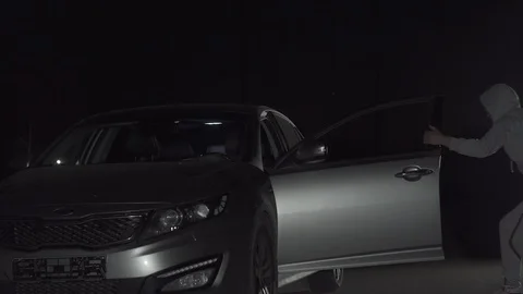 Drunk driver sits behind the wheel. night scene Stock Footage 97278092