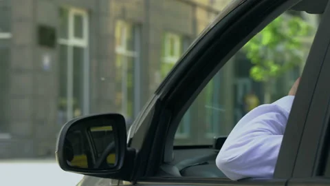 Drunk driver stops at traffic light, drinking beer while driving, car crash risk Stock Footage 91607178