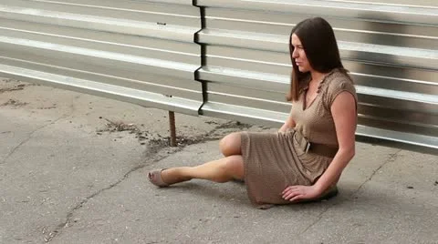 Drunk girl on sidewalk | Stock Video | Pond5