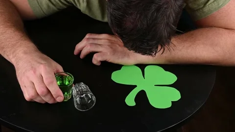 Drunk guy passed out at St Patricks Day celebration party Stock Footage 231721910