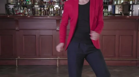Drunk lady tries to dance with a man Stock Footage 68972046