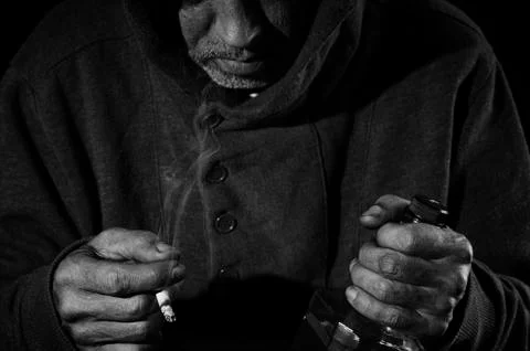 Drunk man with a bottle. Stock Photos