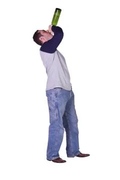 Drunk man drinking out of a wine bottle Stock Photos