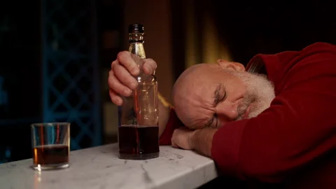 Drunk man in his 50s sleeps in dark room after unpaid bills, financial problems Stock Footage 342520328